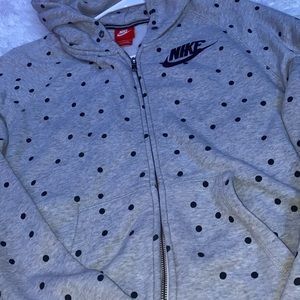 Youth Large zip up nike polkadot jacket.